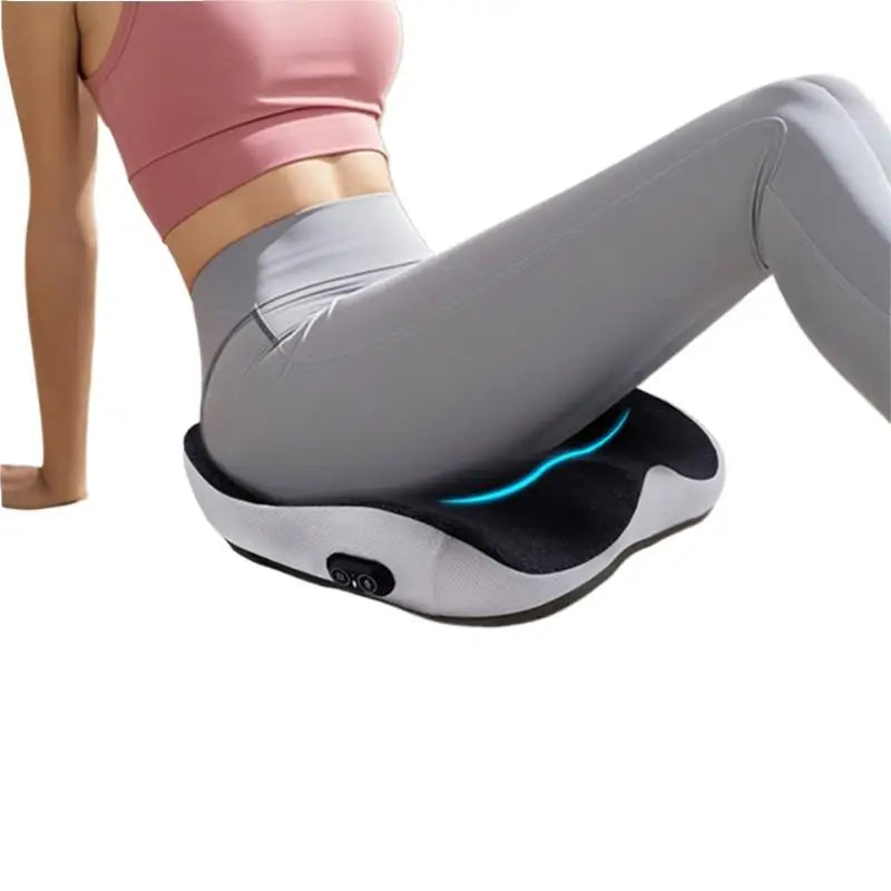 Massage cushion for office use, designed to relieve pressure on the coccyx from prolonged sitting, with vibration